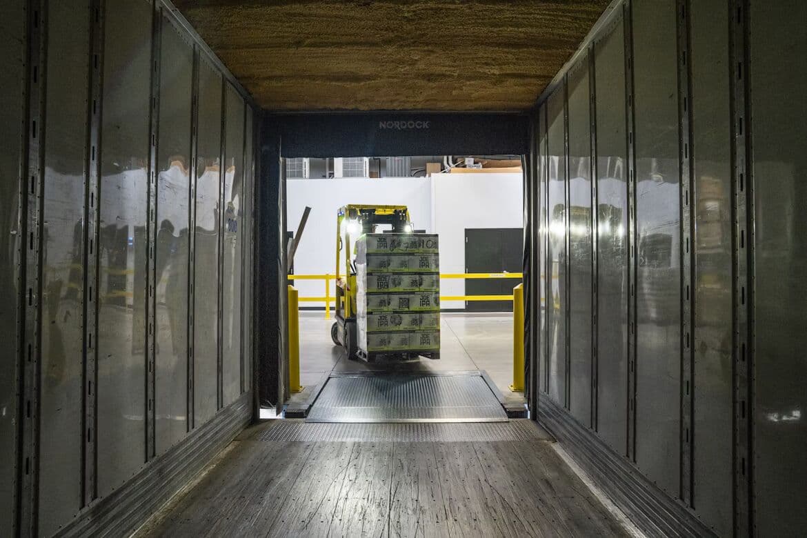 Industrial load being moved into a semi-trailer