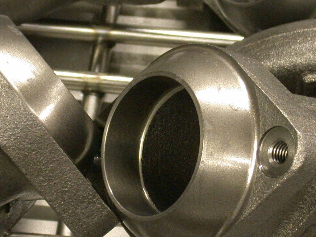 Metal manifold after rust removal and finishing