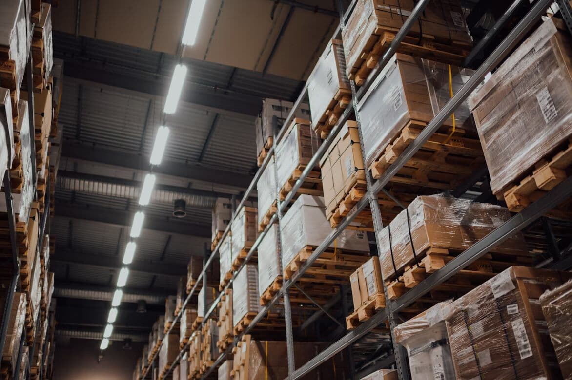Tall storage racks inside an industrial warehouse